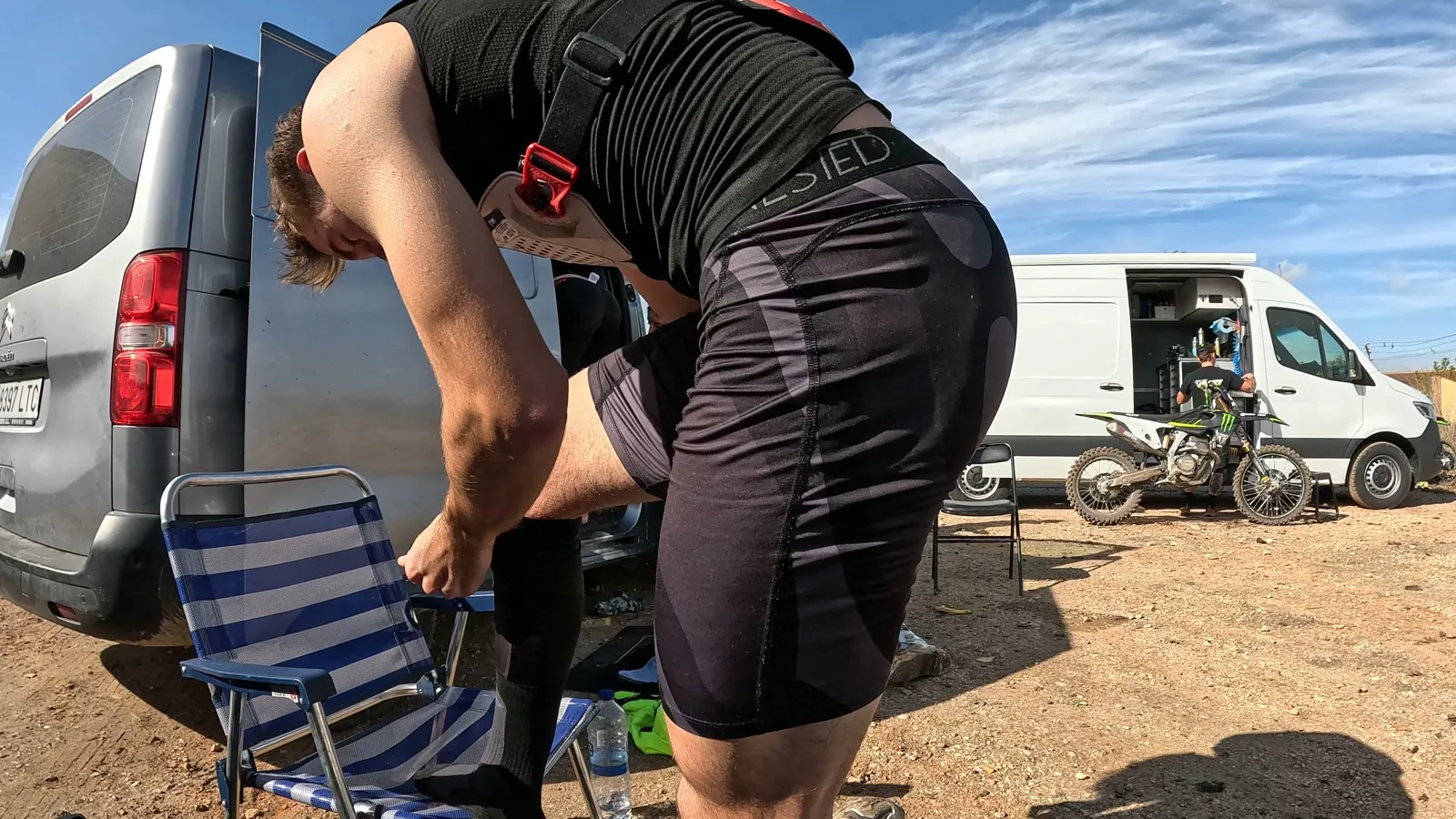 Rider kitting up in the paddock in Nested